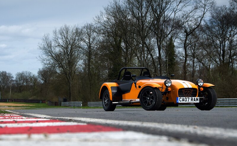 Orange sports car on a racetrack