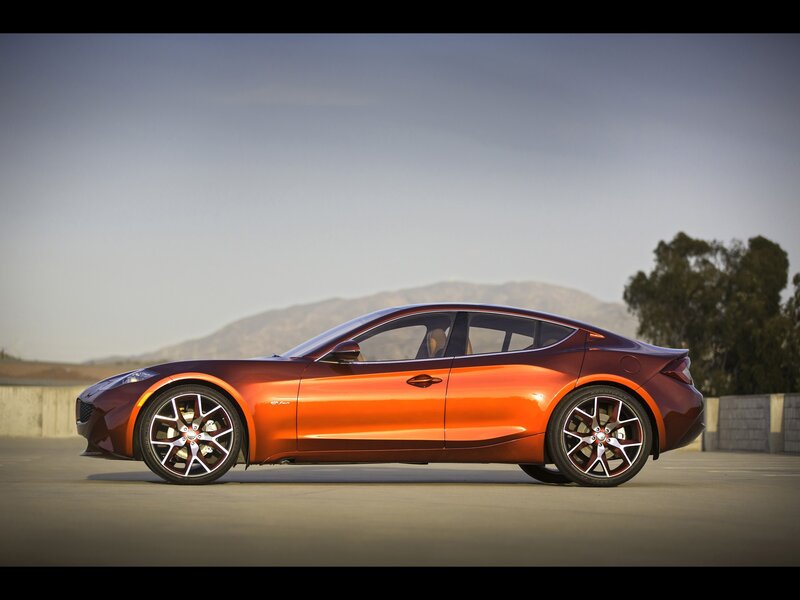 Orange sports car on a road