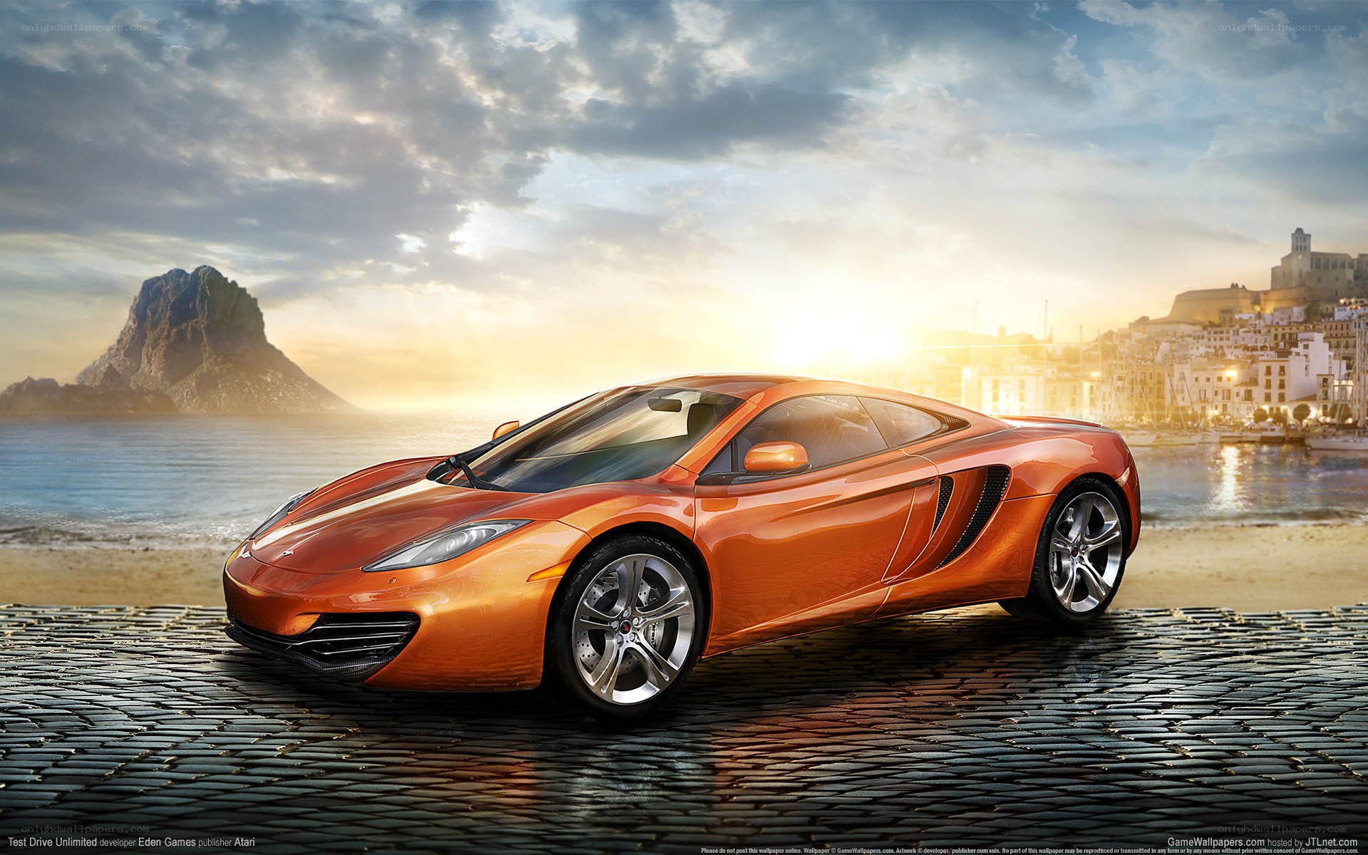 Orange sports car on cobblestone