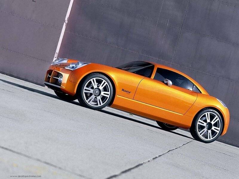 Orange sports car on concrete