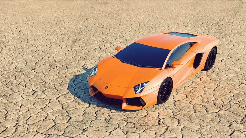 orange sports car on cracked earth