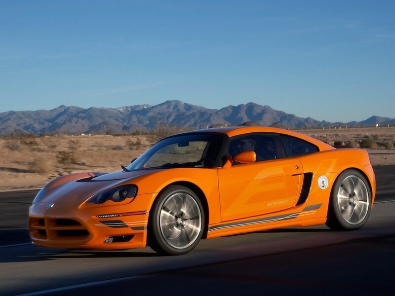 Orange sports car on desert road