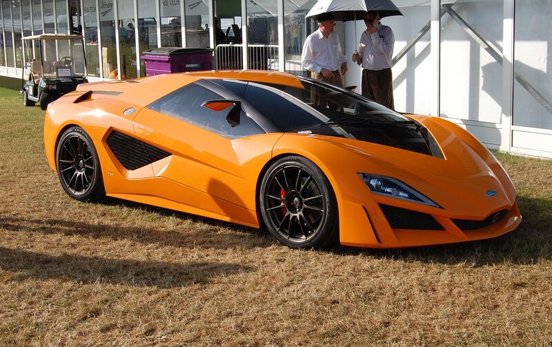 Orange sports car on display