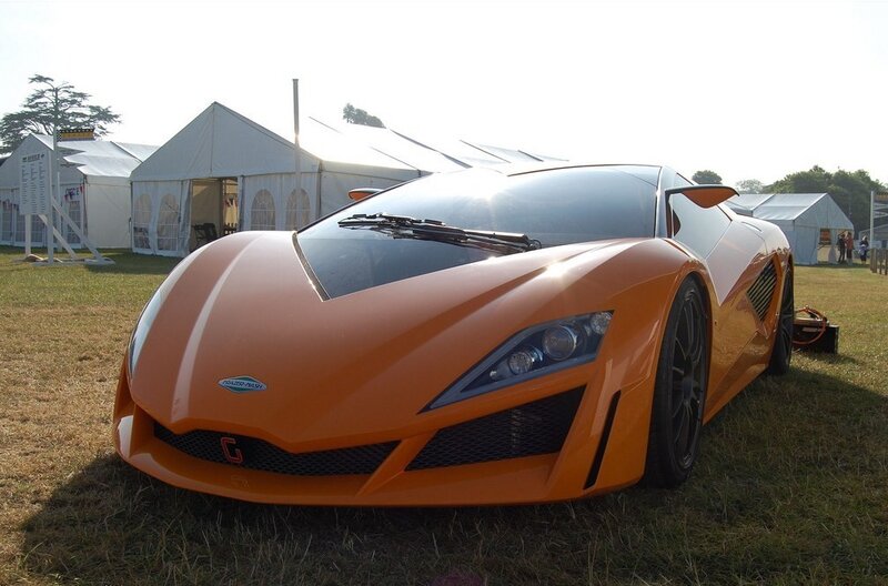 Orange sports car on display