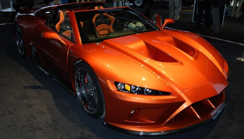 orange sports car on display