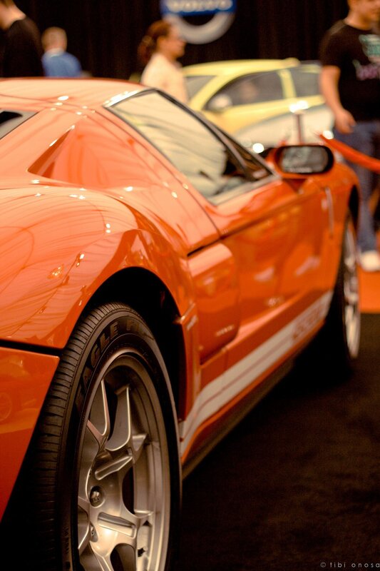 Orange sports car on display