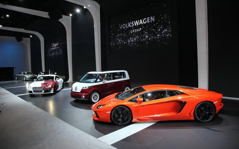 Orange Sports Car on Display — Dramatic