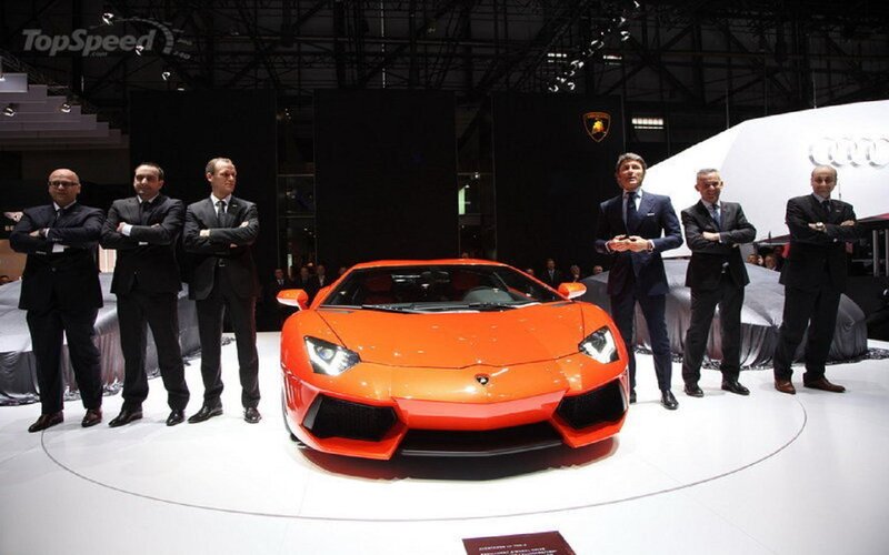 Orange Sports Car on Display — Formal