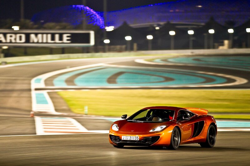 Orange sports car on race track