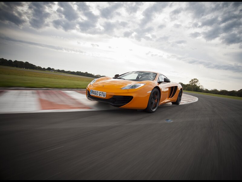 Orange sports car on racetrack