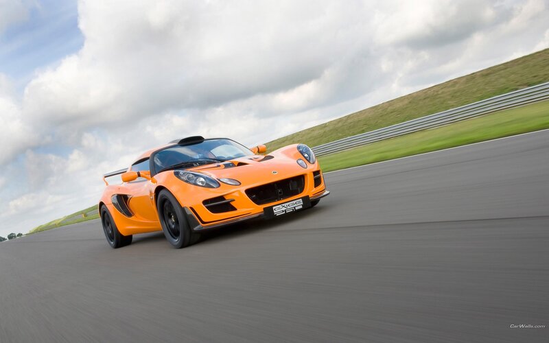 orange sports car on racetrack