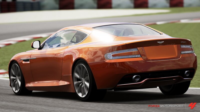 orange sports car on racetrack