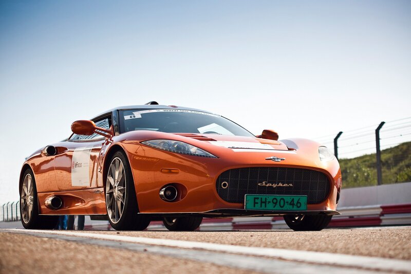 Orange sports car on racetrack