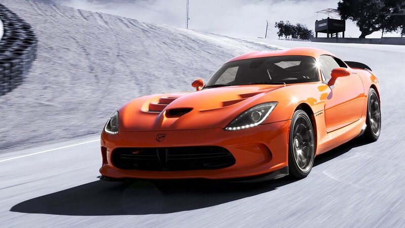 orange sports car on racetrack