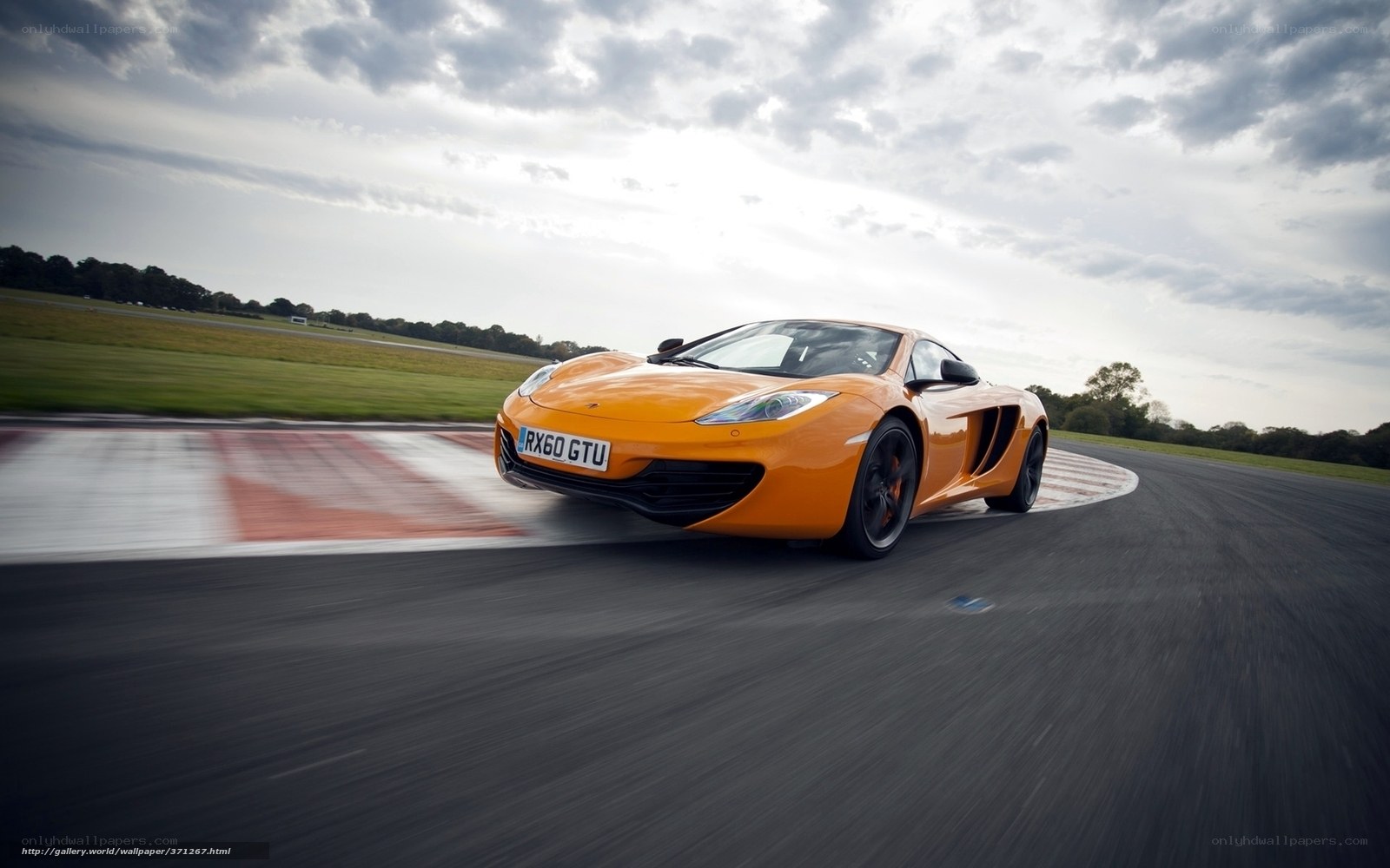Orange sports car on racetrack