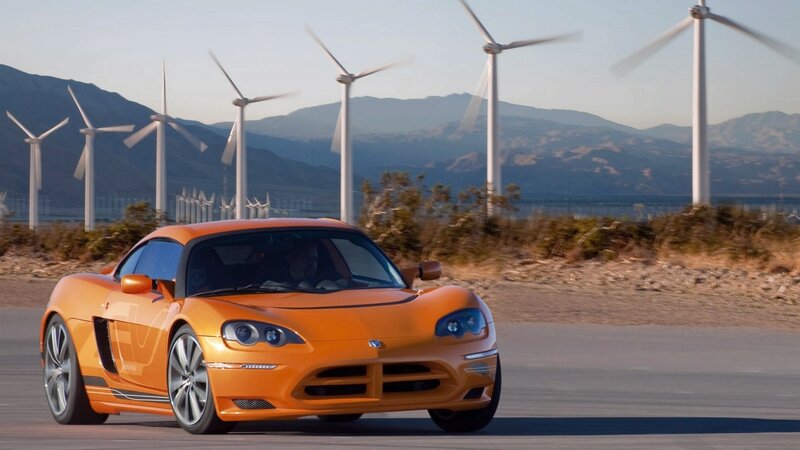 Orange sports car on road