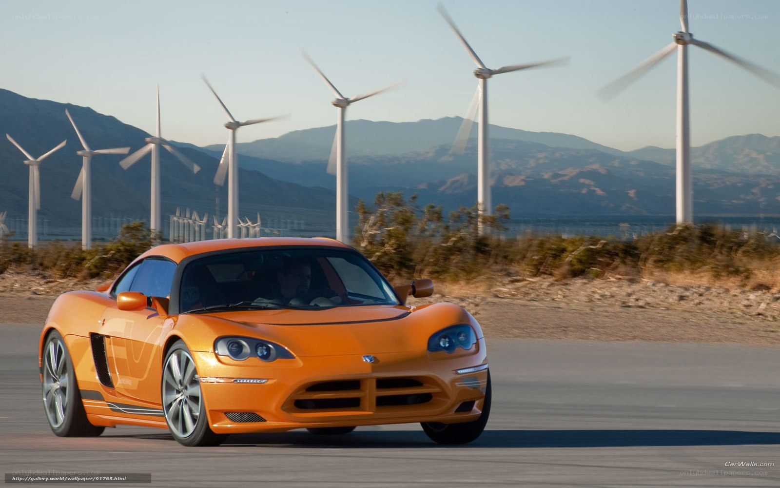 Orange sports car on road
