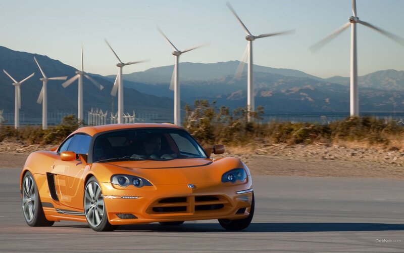 Orange sports car on road