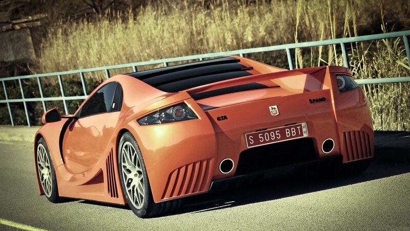 orange sports car on road