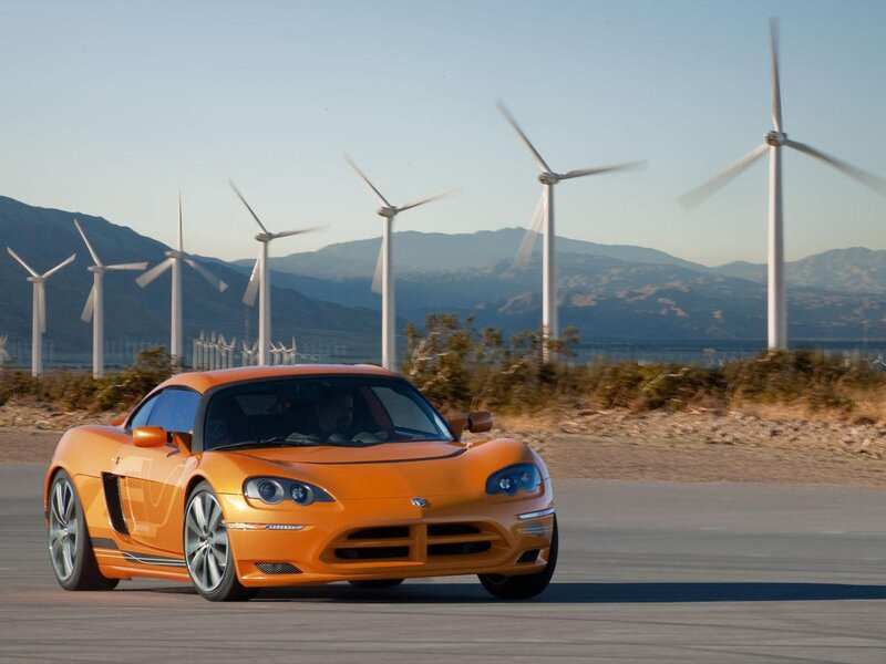 Orange sports car on road