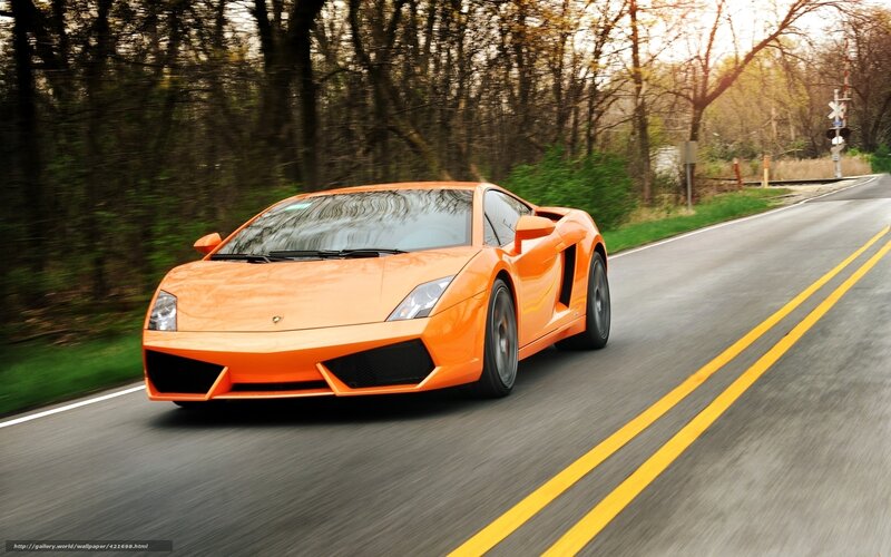 orange sports car on road