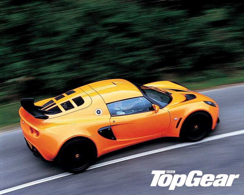 Orange sports car on road