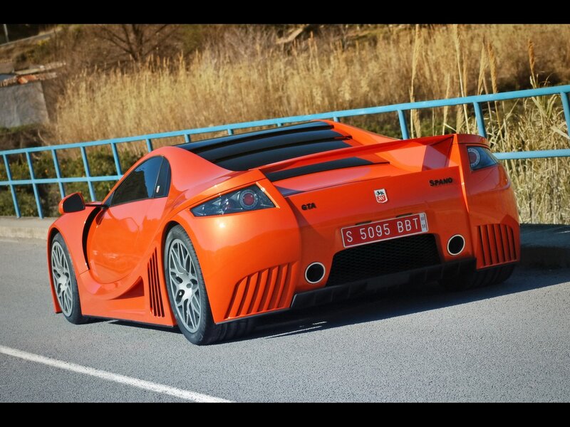 Orange sports car on road