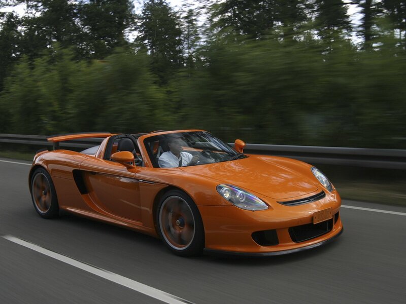 orange sports car on road