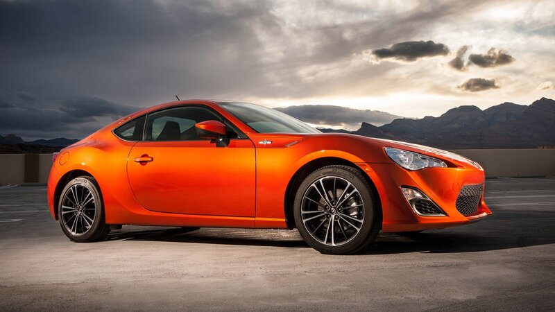 Orange sports car on rooftop