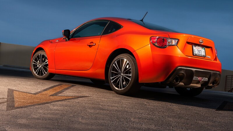 Orange sports car on rooftop