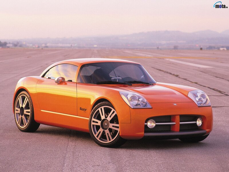 Orange sports car on runway