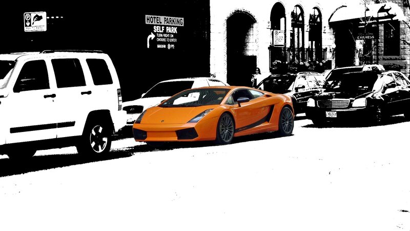 Orange sports car on street