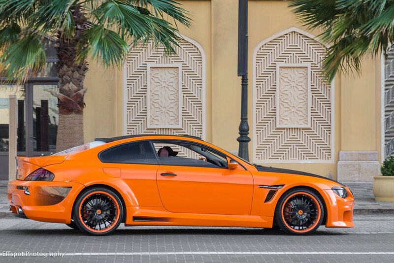 Orange sports car on street