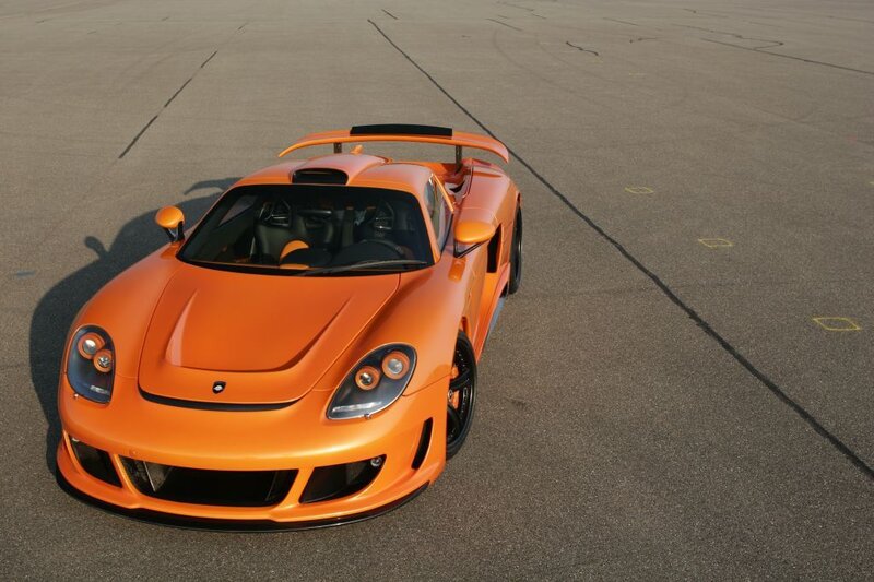 Orange sports car on tarmac