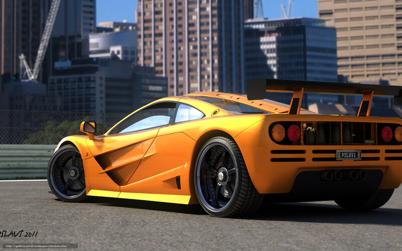 orange sports car on track