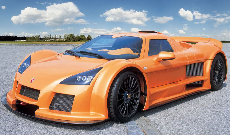 orange sports car on track