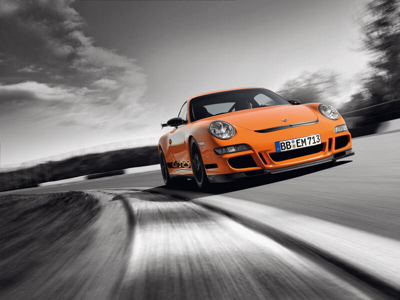 orange sports car on track