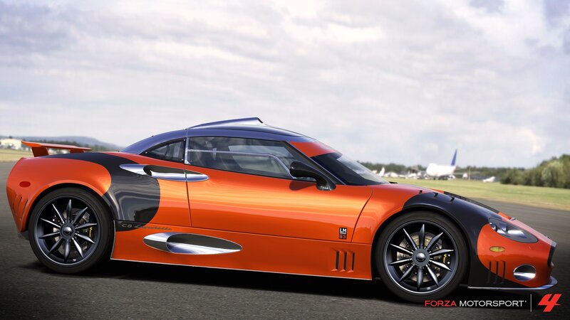 orange sports car on track