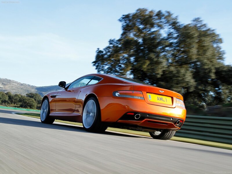 orange sports car on track