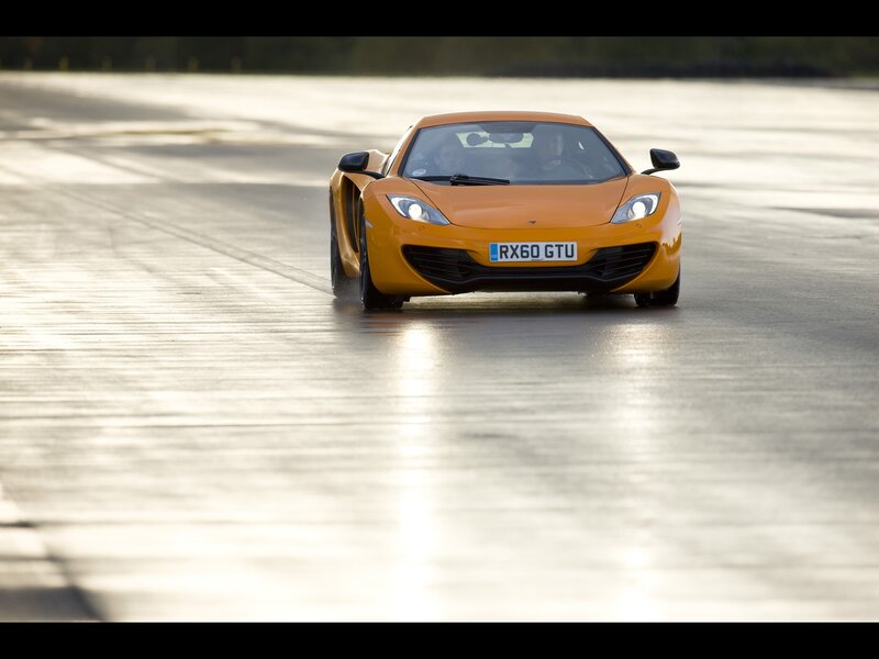 Orange sports car on track