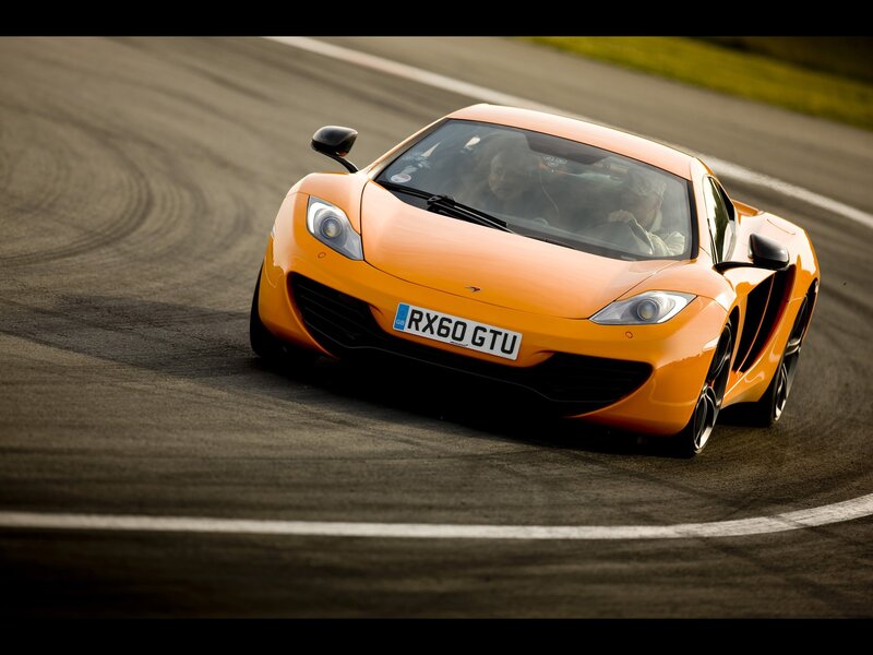 orange sports car on track