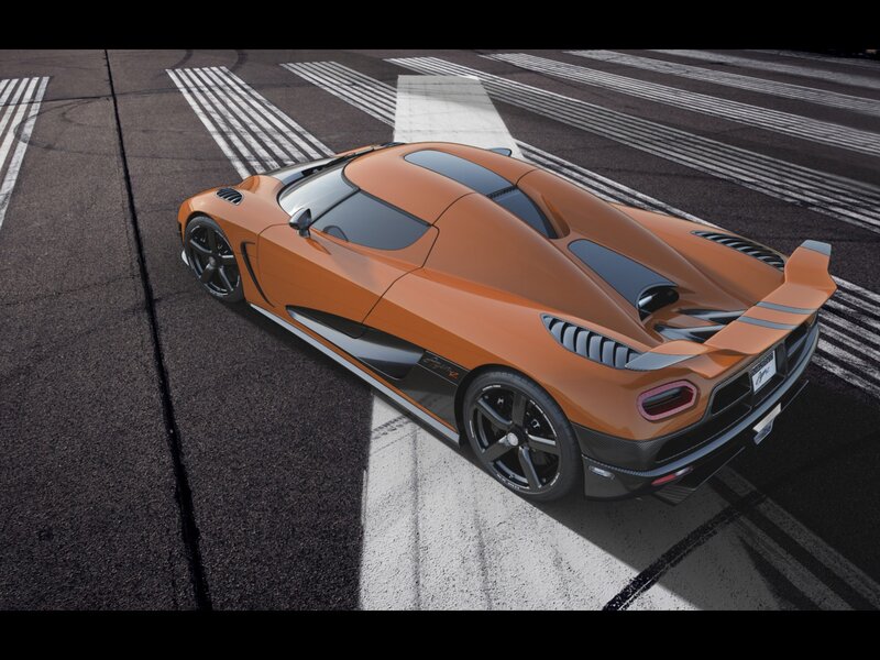 orange sports car on track