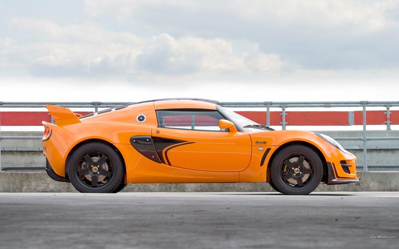 orange sports car on track