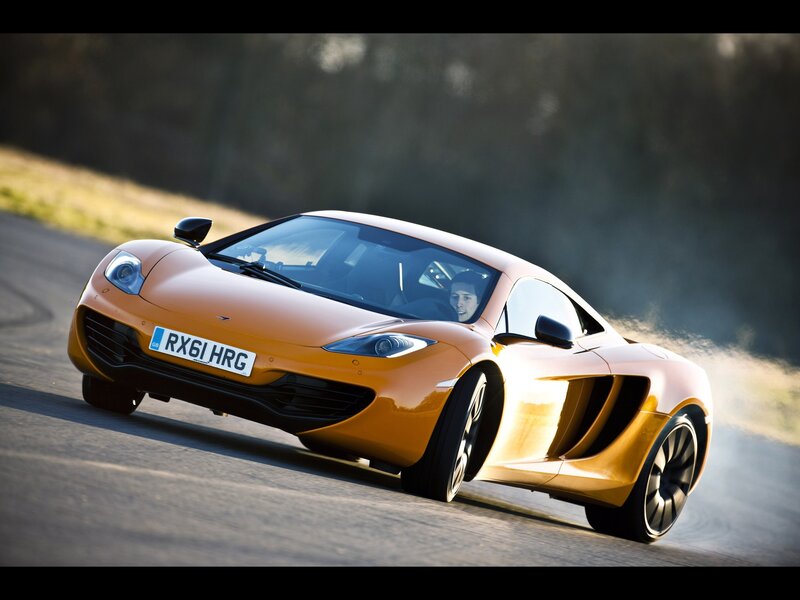 orange sports car on track