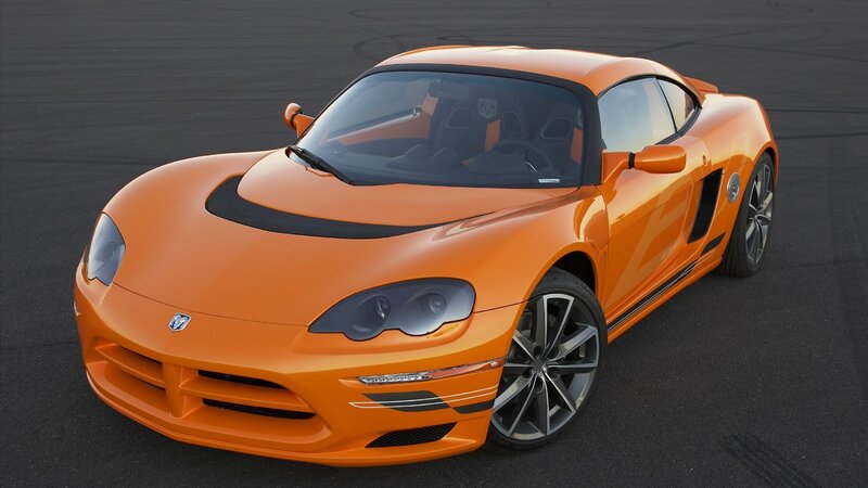 orange sports car on track