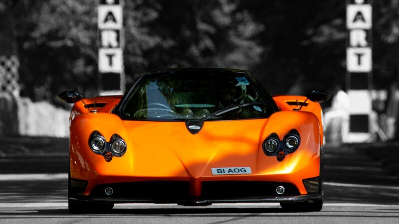 orange sports car on track