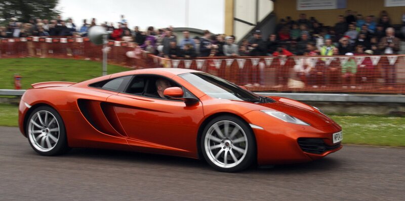 Orange sports car on track