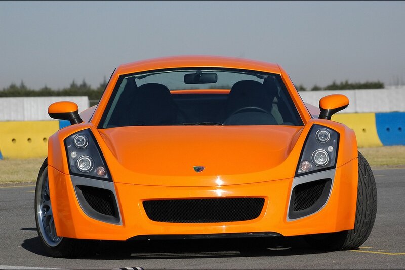 orange sports car on track
