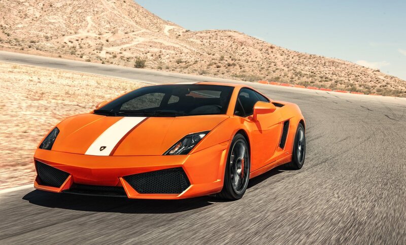 orange sports car on track