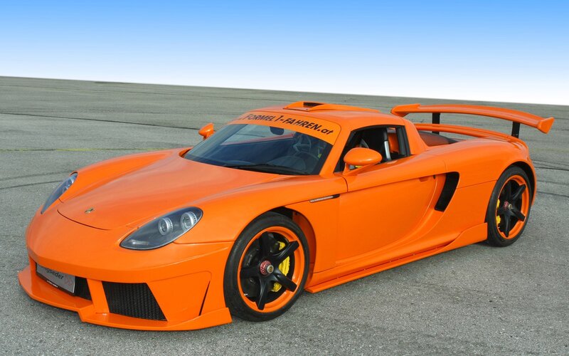 Orange sports car on track